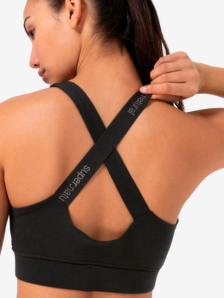 super.natural Rubberribbra naisten merinovillainen urheiluliivi, Jet Black